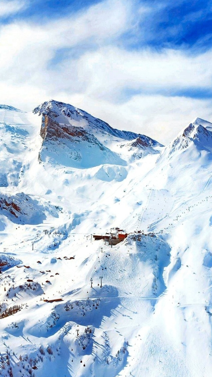 Обои гора, зима, горный хребет, горный рельеф, ледяная форма в разрешении 720x1280