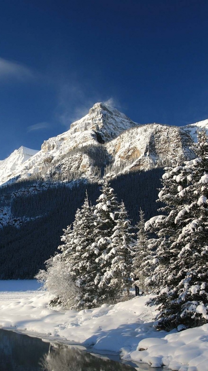 Обои озеро Луиза, банфф, снег, горный рельеф, гора в разрешении 720x1280