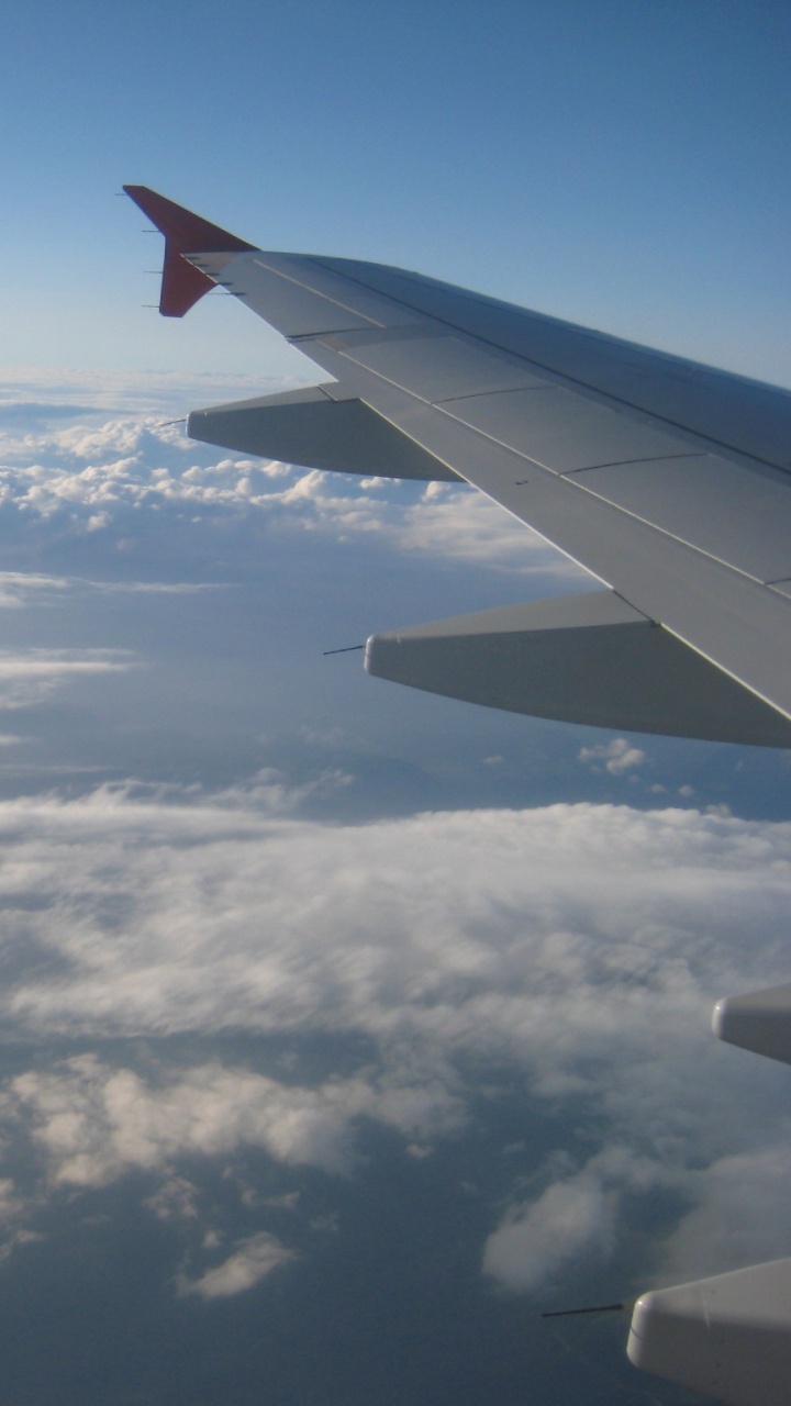 Обои самолет, авиакомпания, воздушное путешествие, авиация, облако в разрешении 720x1280