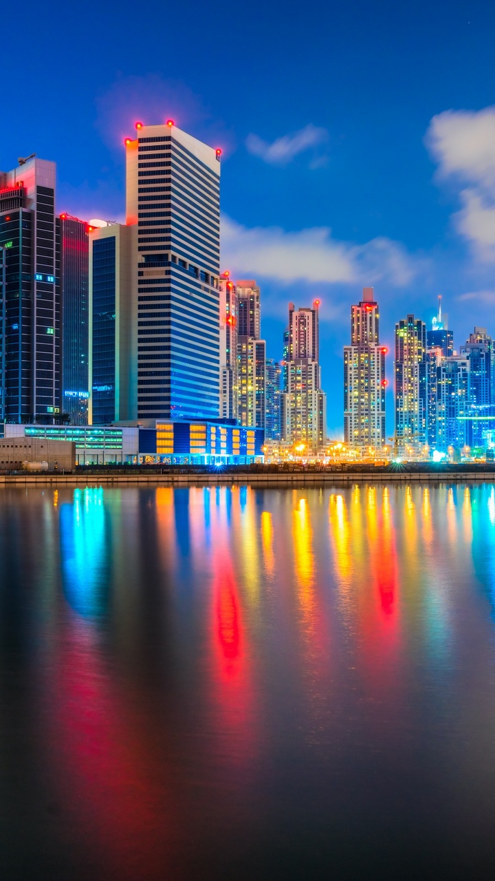 Обои городской пейзаж, город, линия горизонта, отражение, метрополия в разрешении 720x1280