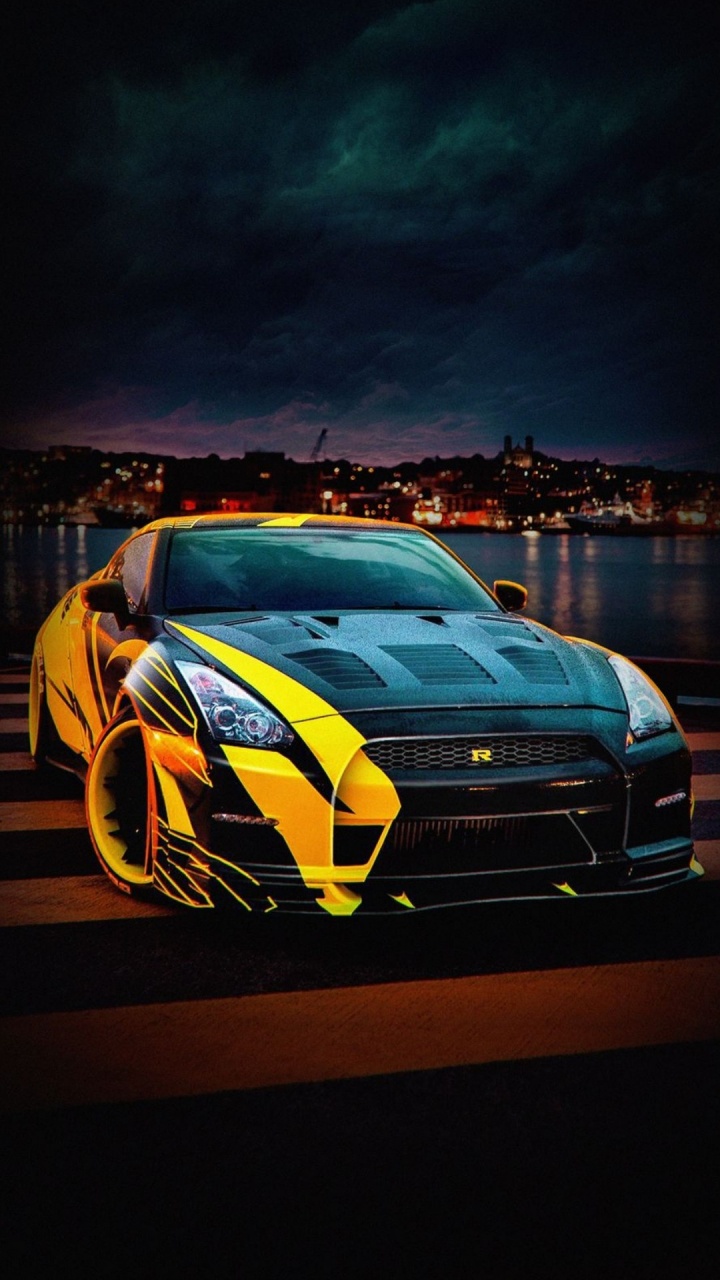 Обои отражение, nissan skyline gt r, nissan gt r, легковые автомобили, колесо в разрешении 720x1280