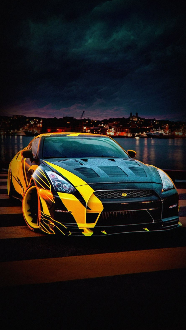 Обои отражение, nissan skyline gt r, nissan gt r, легковые автомобили, колесо в разрешении 750x1334