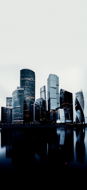 Обои небоскреб, вода, здание, башня, кондоминиум в разрешении 1356x2934